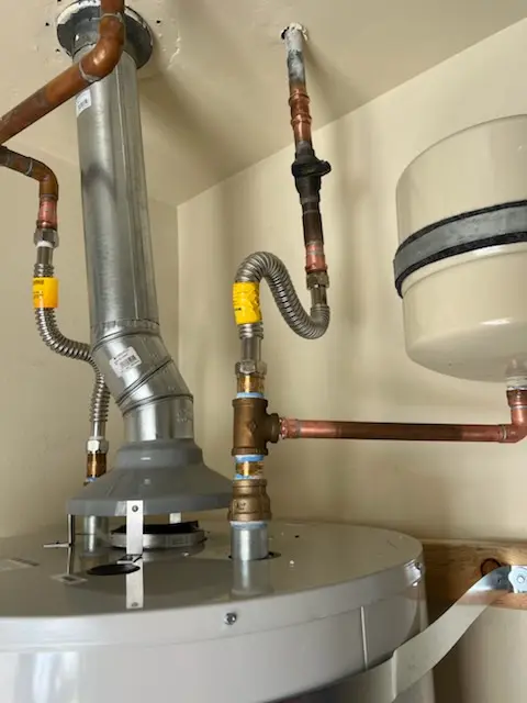 Water heater installation and plumbing repair in McKinley